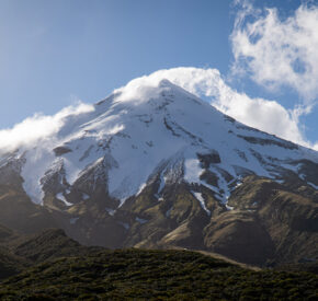 Shot of Taranaki Maunga, a snowy-topped mountain in New Zealand